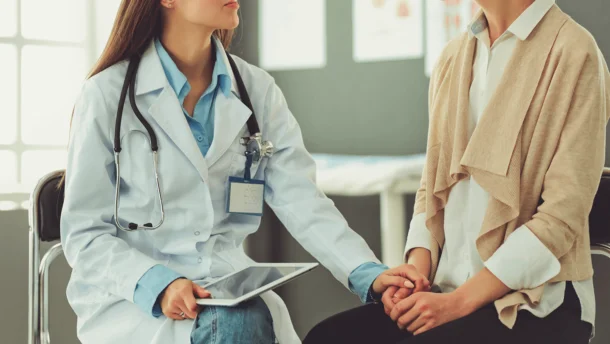 Doctor consulting patient